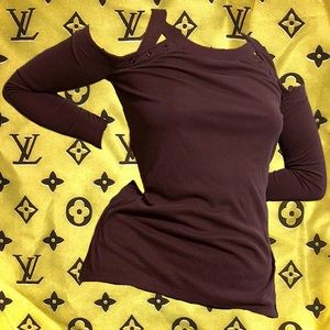 dull purple-maroon shirt with holes in shoulders